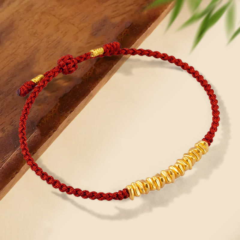 Buddha Stones ​​999 Gold Kleine Goldstücke Design Handgefertigtes Schutzarmband aus geflochtenem Seil - Braun (Gold, ca. 0,75 g) - 21 cm - image 0