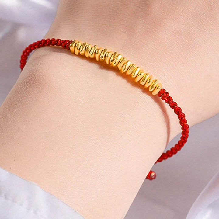 Buddha Stones ​​999 Gold Kleine Goldstücke Design Handgefertigtes Schutzarmband aus geflochtenem Seil - Rot (Gold, ca. 0,75 g) - 21 cm - image 12