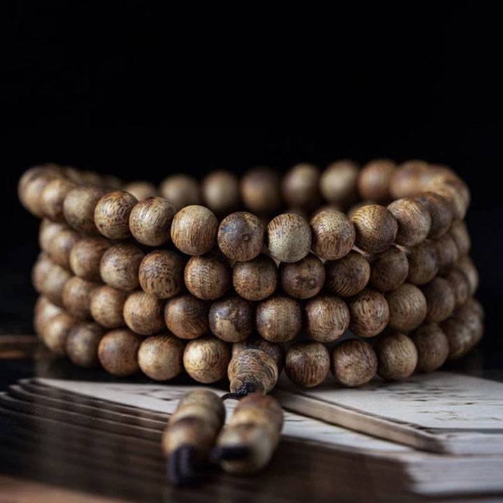 Buddha Stones 108 Mala-Perlen Hainan Weiß Qinan Adlerholz Ruhe Kraft Armband