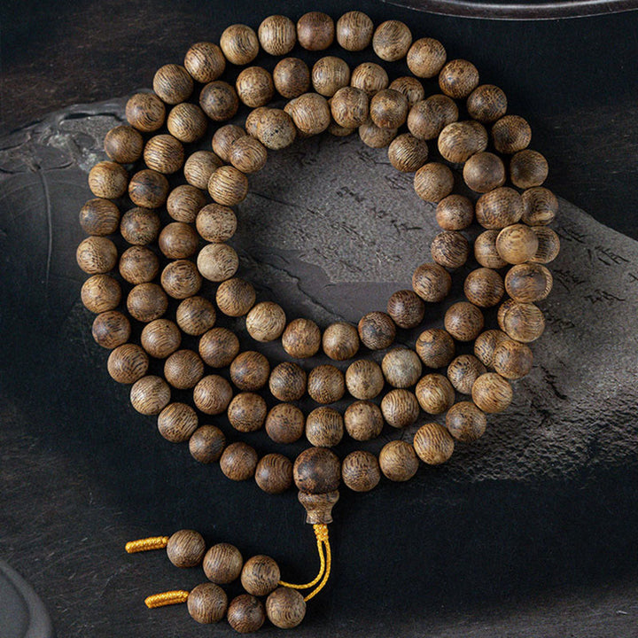 Buddha Stones 108 Mala-Perlen Hainan Weiß Qinan Adlerholz Ruhe Kraft Armband