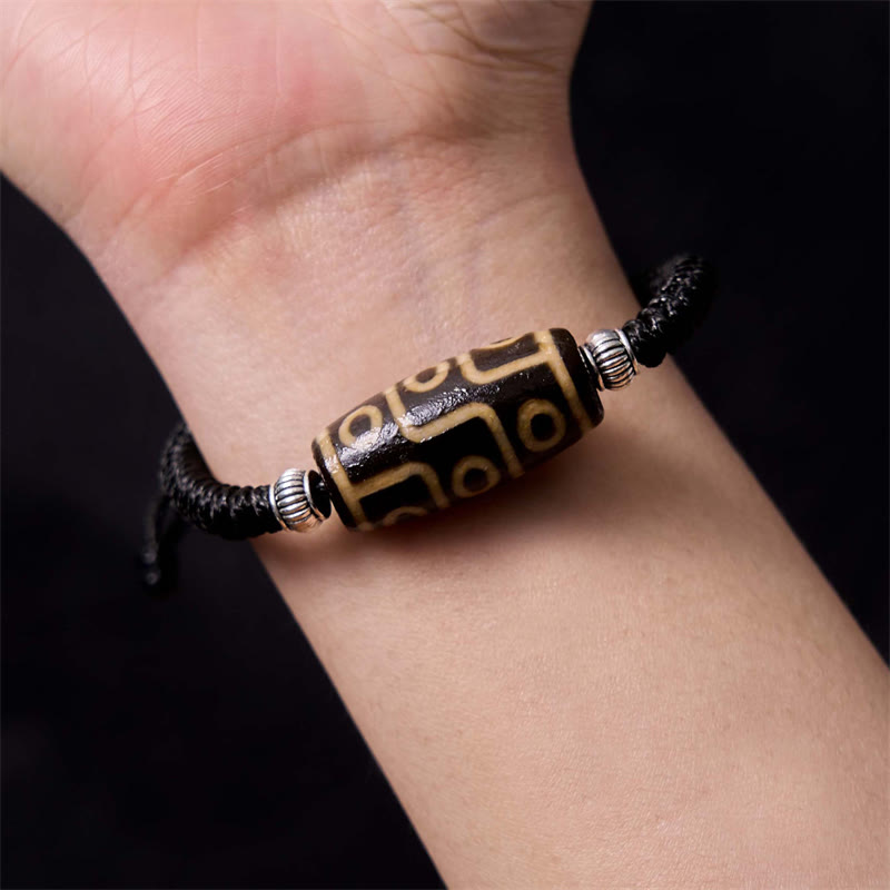 Buddha Stones Tibetisches neunsichtiges Dzi-Perlen-Armband Dreiaugiges Dzi-Perlen-Armband Reichtumsschutzseil-Armband