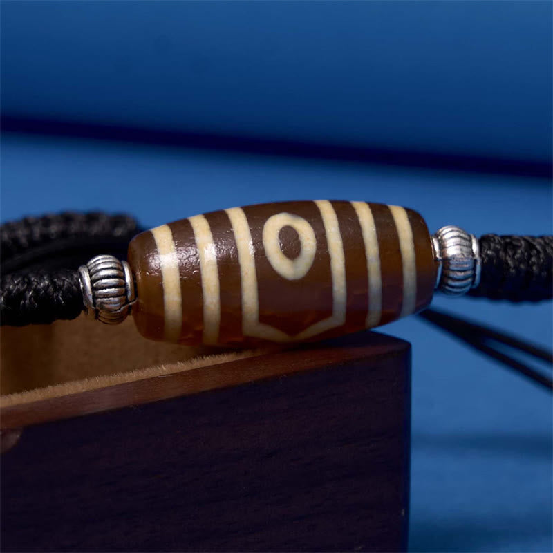 Buddha Stones Tibetisches neunsichtiges Dzi-Perlen-Armband Dreiaugiges Dzi-Perlen-Armband Reichtumsschutzseil-Armband