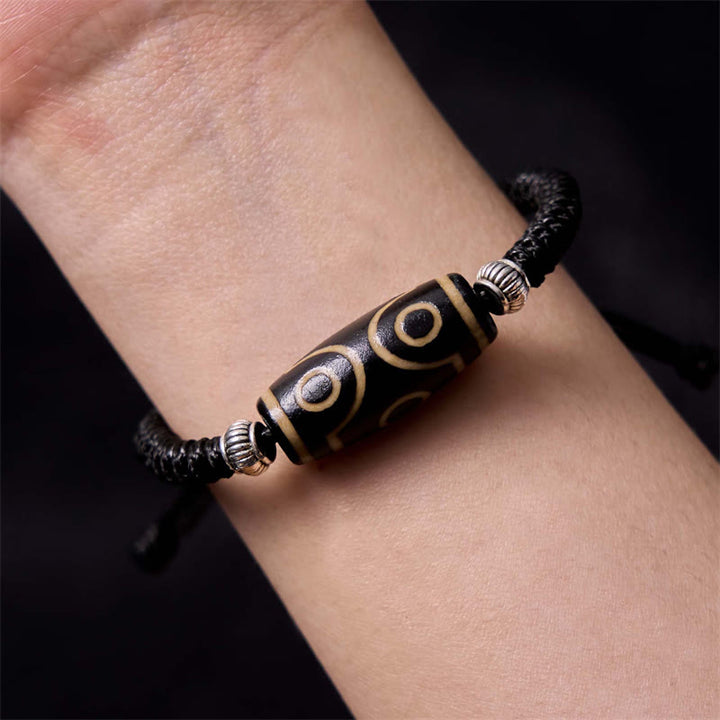 Buddha Stones Tibetisches neunsichtiges Dzi-Perlen-Armband Dreiaugiges Dzi-Perlen-Armband Reichtumsschutzseil-Armband