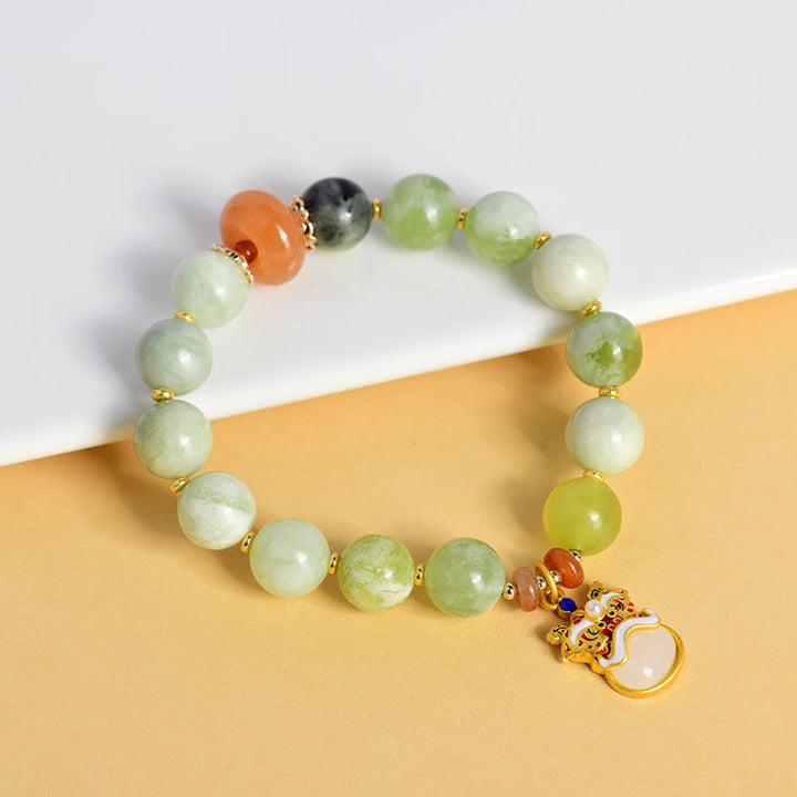 Armband mit Buddha Stones aus natürlicher Jade mit tanzendem Löwen-Charme für Wohlstand und Glück