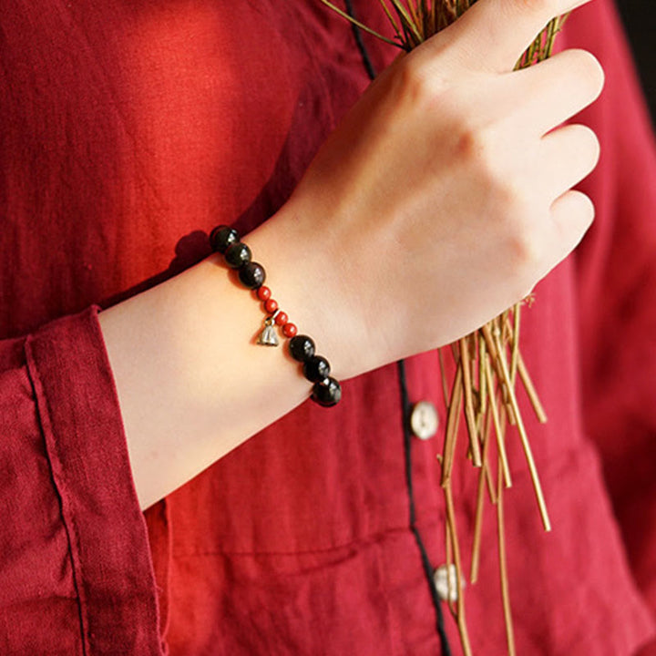 Armband mit Buddha Stones , natürlichem schwarzem Obsidian und Zinnober, Lotus-Charme, Stärke, Erfüllung