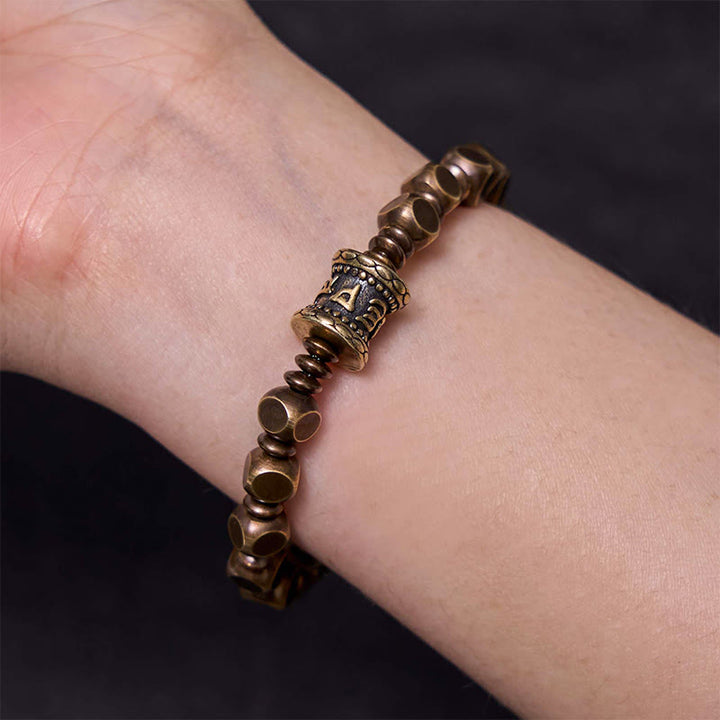 Buddha Stones Tibetisches Om Mani Padme Hum Amulett-Fokus-Armband aus geschnitztem Kupfer und Messing