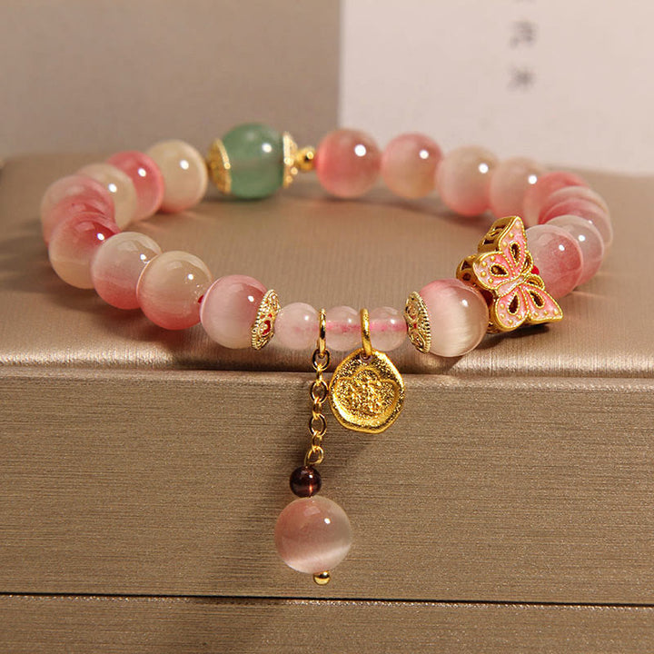 Buddha Stones Farbverlauf Rosa Katzenauge Schmetterling Peace Armband