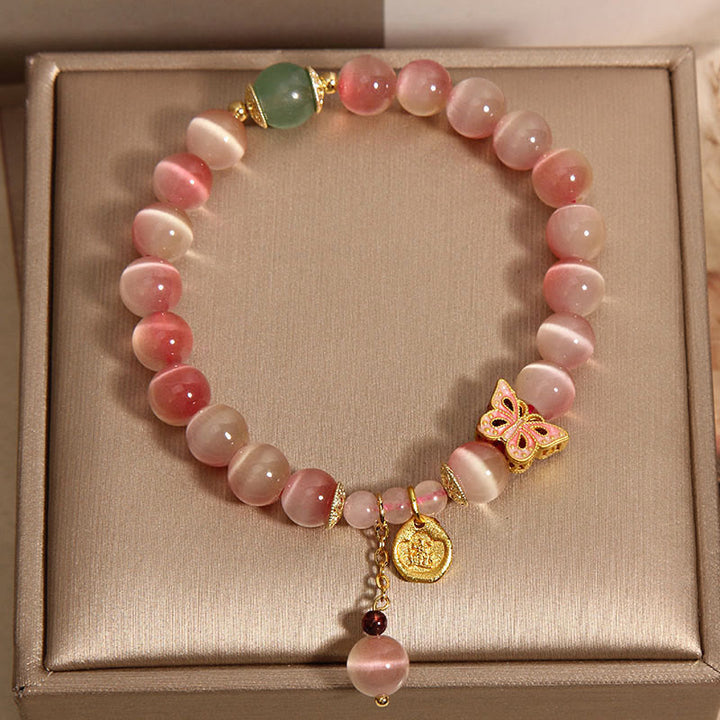 Buddha Stones Farbverlauf Rosa Katzenauge Schmetterling Peace Armband