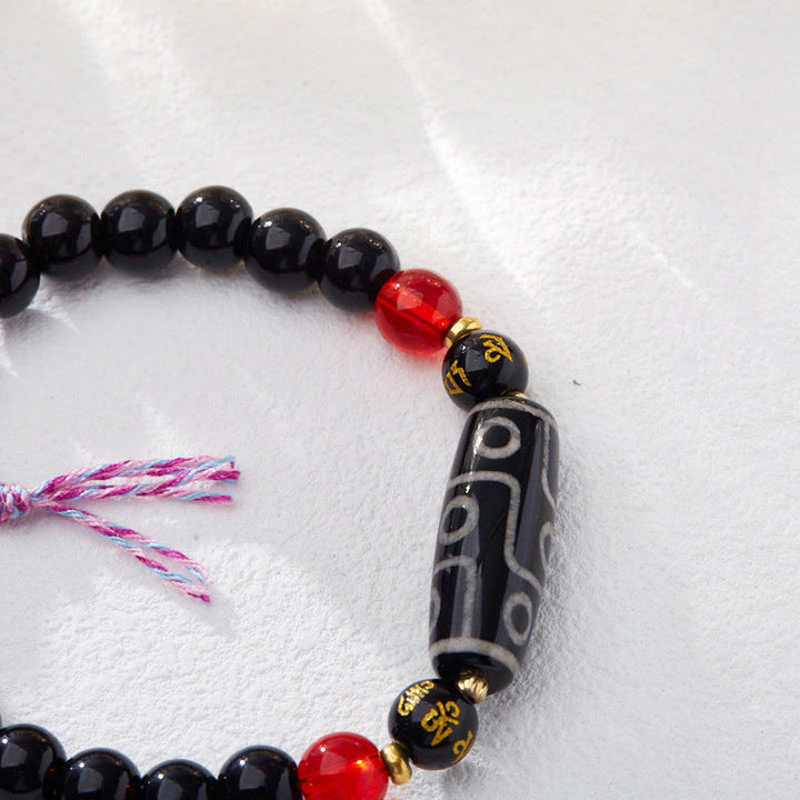 Buddha Stones Tibetisches Neunaugen-Dzi-Perlen-Armband mit schwarzem Onyx und sechs wahren Worten zum Schutz des Reichtums