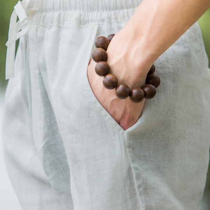 Buddha Stones - Einfarbige Herrenhose aus Leinen mit weitem Bein und Taschen