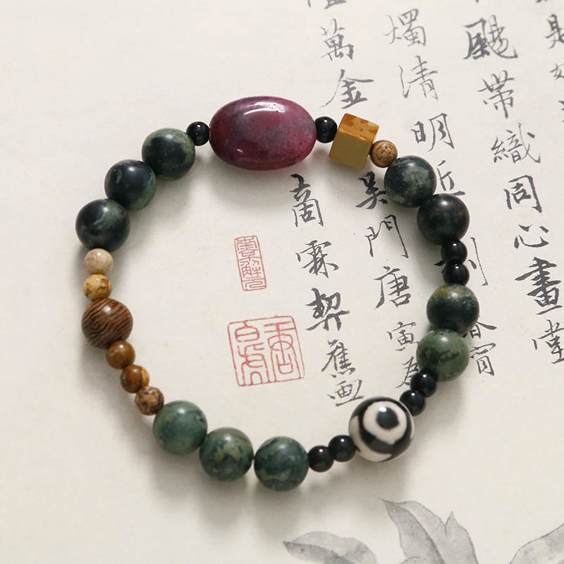 Buddha Stones Armband mit dreiäugigen Dzi-Perlen aus grünem Achat und Krafterfolg