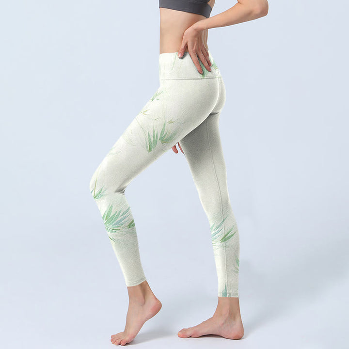 Buddha Stones Grüne Bambusblätter Print Sport Leggings Damen Yogahose