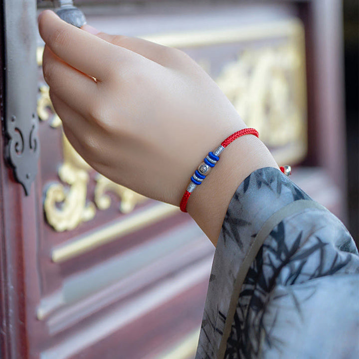 Schutzarmband mit Buddha Stones und roten chinesischen Schriftzeichen