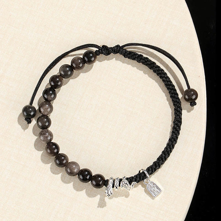 Buddha Stones Natürlicher Erdbeerquarz Silberglanz Obsidian Jahr der Schlange Schnur Schutz Geflochtenes Armband