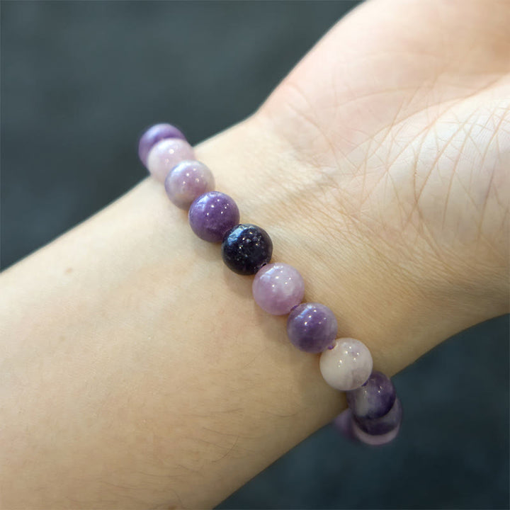 Buddha Stones Positives Armband aus violettem Glimmerstein