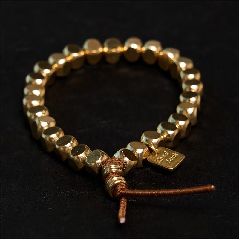 Buddha Stones, Messing-Kupfer-Schnur, Glücks- und Selbstfürsorge-Armband - Messing (Handgelenkumfang: 20-21 cm) - image 0