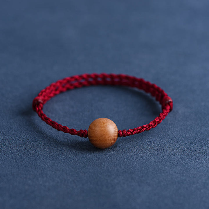 Buddha Stones, natürliche Pfirsichholzperle, zur Abwehr böser Geister, geflochtenes Armband