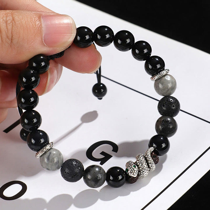 Buddha Stones Armband „Jahr der Schlange“ aus 999er Sterlingsilber mit schwarzem Glitzerstein, weißem Türkis und schwarzem Onyx