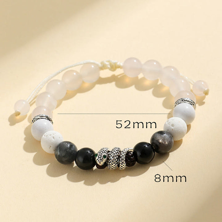 Buddha Stones Armband „Jahr der Schlange“ aus 999er Sterlingsilber mit schwarzem Glitzerstein, weißem Türkis und schwarzem Onyx