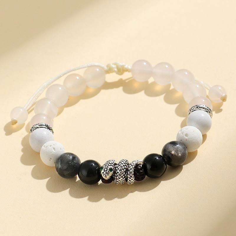 Buddha Stones Armband „Jahr der Schlange“ aus 999er Sterlingsilber mit schwarzem Glitzerstein, weißem Türkis und schwarzem Onyx