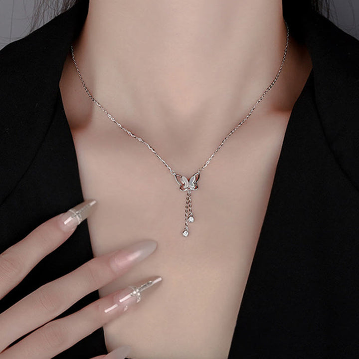 Buddha Stones Halskette mit Anhänger aus 999er Sterlingsilber mit Tridacna-Stein und Schmetterling - image 8