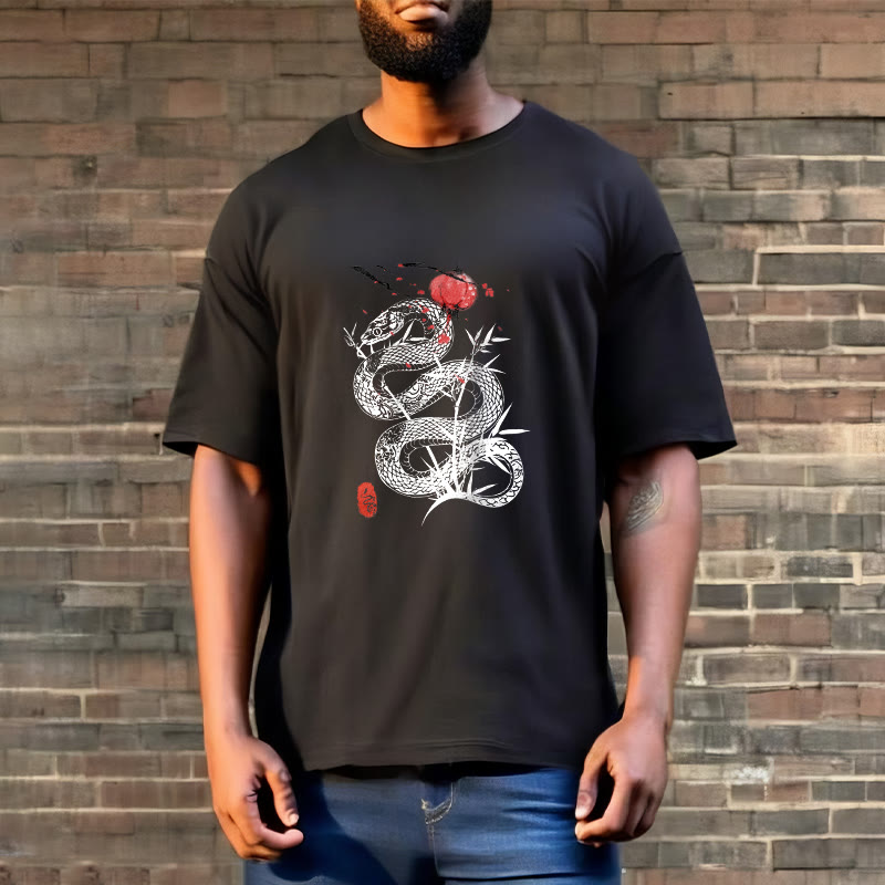 Buddha Stones T-Shirt aus Baumwolle mit Laternenmotiv, Bambusblättern und Schlangenmuster - image 1