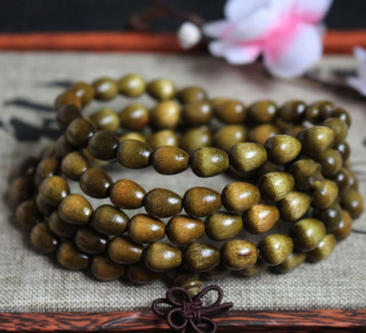 Buddha Stones 108 Mala Tropfenperlen Natur Phoebe Zhennan Holz Schutzarmband