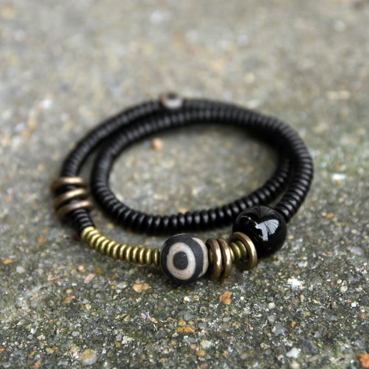 Buddha Stones , Ebenholz, grünes Sandelholz, Kupfer, Messing, Dzi-Perle, schwarzer Onyx, ruhiges Doppel-Wickelarmband