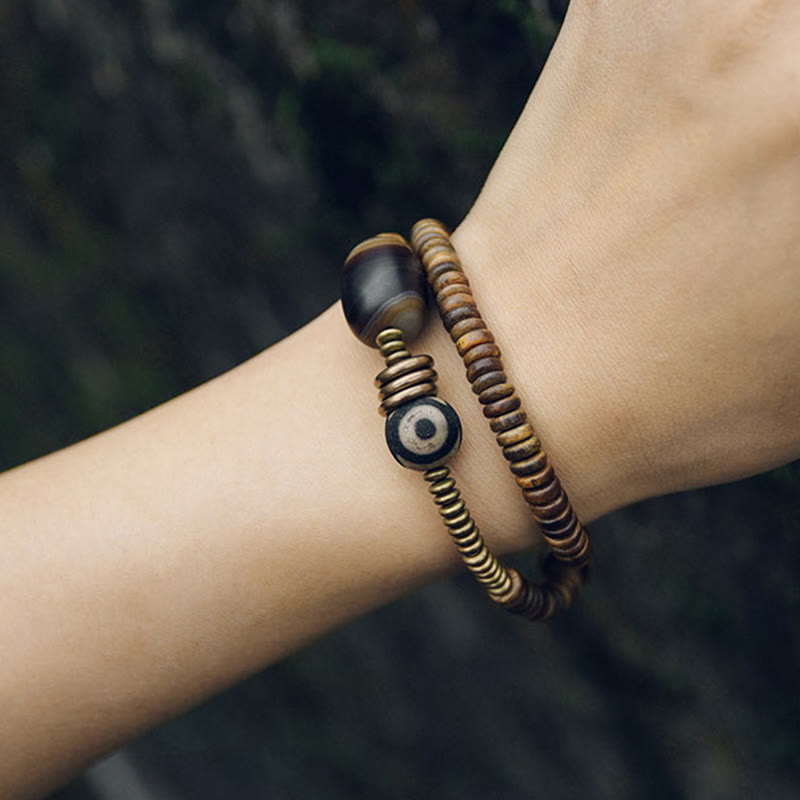 Buddha Stones , Ebenholz, grünes Sandelholz, Kupfer, Messing, Dzi-Perle, schwarzer Onyx, ruhiges Doppel-Wickelarmband