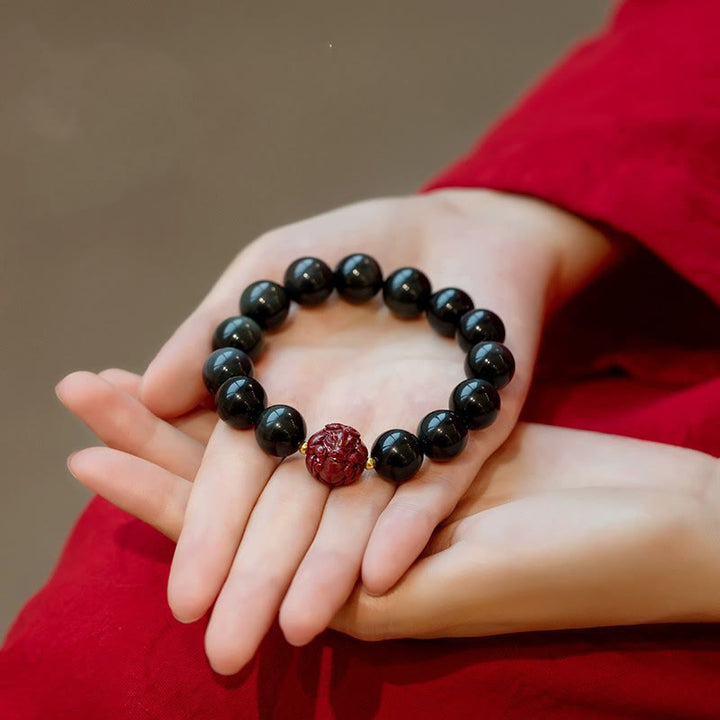 Buddha Stones, chinesisches Sternzeichen, natürliches schwarzes Obsidian-Zinnober-Reinigungsarmband