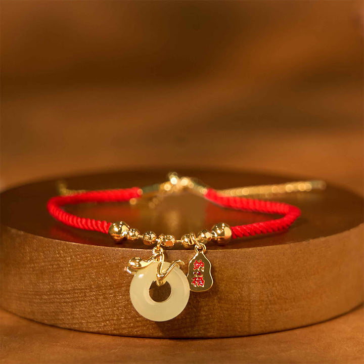 Buddha Stones , Kupfer, vergoldet, Jade, Friedensschnalle, Fu-Charakter, Jahr der Schlange, rote Schnur, Glücksarmband - Rotes Armband mit Friedensschnalle (Handgelenkumfang: 14-17 cm) - image 0