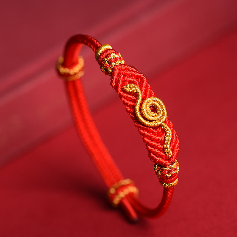 Handgemachtes rotes Armband mit acht Fäden des Friedensknotens aus Buddha Stones, Jahr der Schlange, Schutz, Glück, geflochten