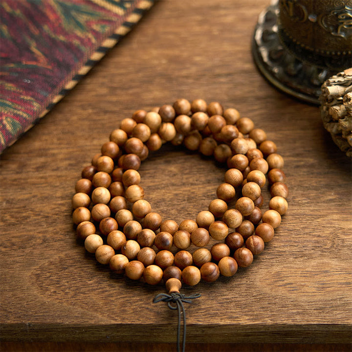 Buddha Stones 108 Mala-Perlen Blitzschlag Pfirsichholz Handpoliertes Schutzarmband - Blitzschlag-Pfirsichholz (Handgelenkumfang: 14-16 cm) - image 0