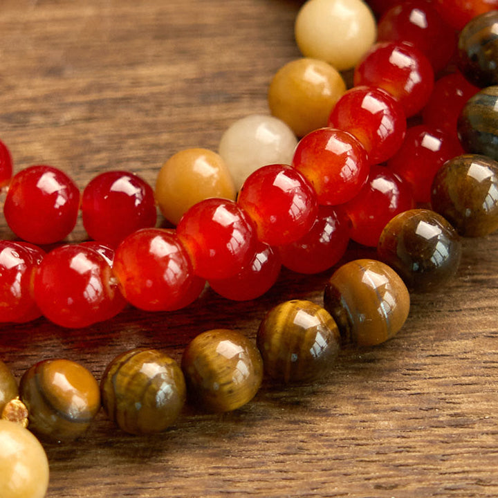 Buddha Stones 108 Mala-Perlen, roter Achat, Tigerauge, gelbe Quaste, ruhiges Armband