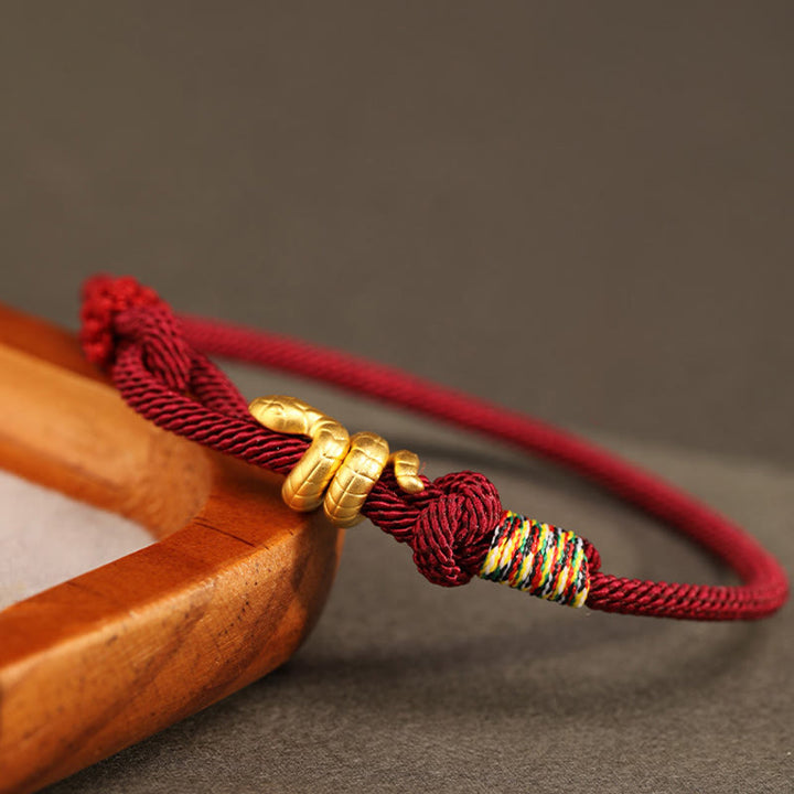 Buddha Stones 999 Gold Jahr der Schlange Design Handgefertigtes Glücksschutzseil Geflochtenes Armband - image 2