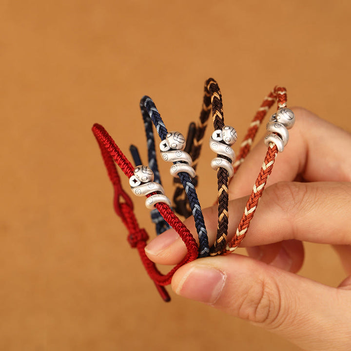 Buddha Stones 999 Sterling Silber Jahr der Schlange Handgemachtes Kupfermünzen-Schutz-Geflochtenes Armband - image 1