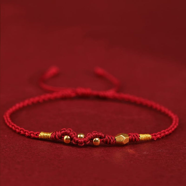 Buddha Stones 999 Gold Jahr der Schlange Mini-Goldperle handgefertigt Glücksschutz geflochtenes Armband