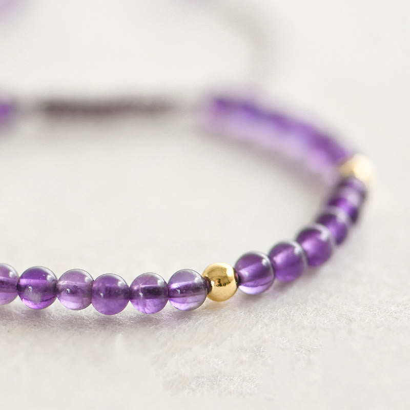 Armband mit Buddha Stones, 4 mm, handgefertigt, natürlicher Amethyst, 14 Karat vergoldete Kupferperlen, geflochtene Schnur, lindert Stress