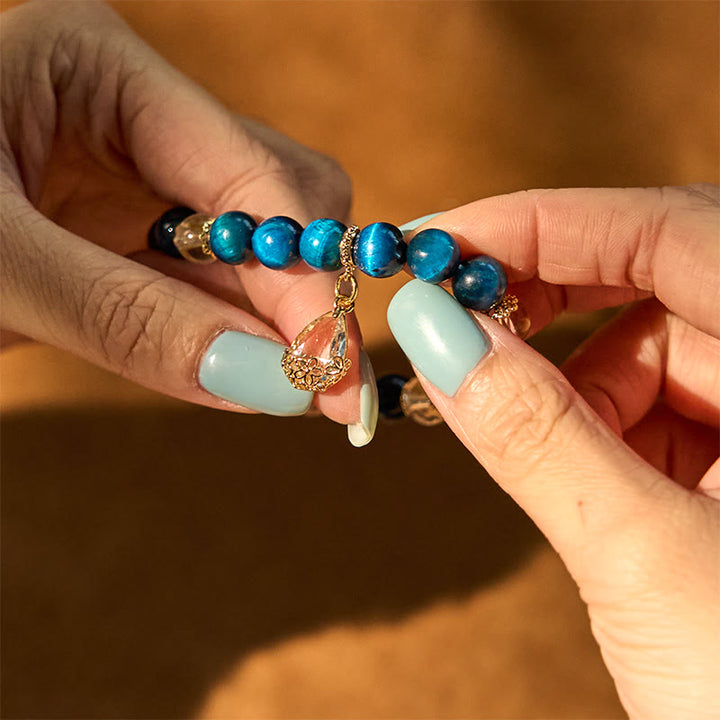 Buddha Stones Armband mit blauem Tigerauge und weißem Kristall, Wassertropfen-Stärke