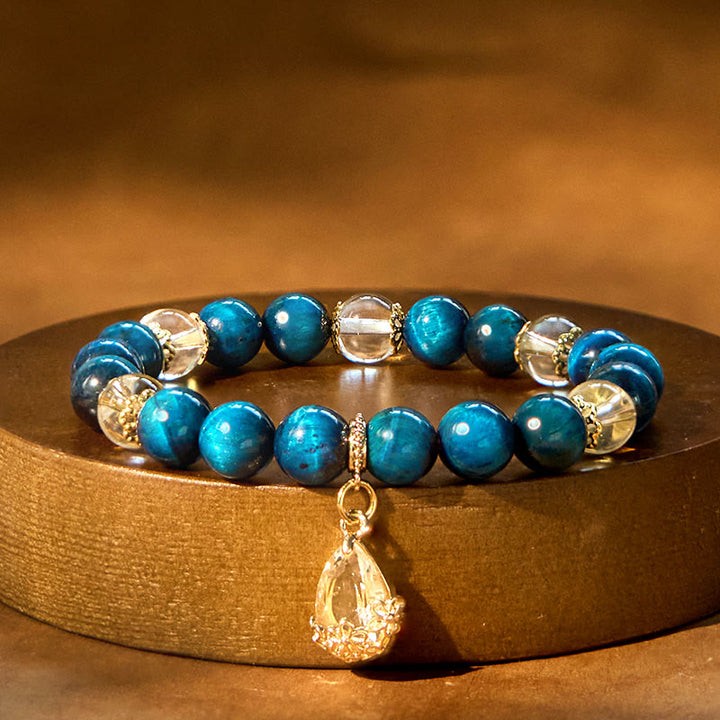 Buddha Stones Armband mit blauem Tigerauge und weißem Kristall, Wassertropfen-Stärke