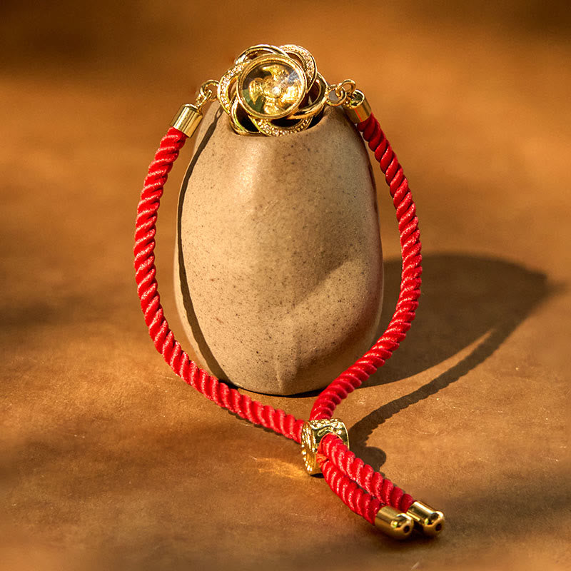 Buddha Stones, drehbar, Pflaumenrot, Schnur, Kupfer, Messing, Windmühle, Feng Sheng Shui, Qi-Schutz, geflochtenes Armband - image 1