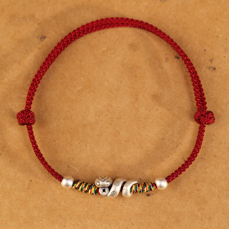 Fußkettchen „Jahr der Schlange“ von Buddha Stones aus 999er Sterlingsilber mit roter Schnur