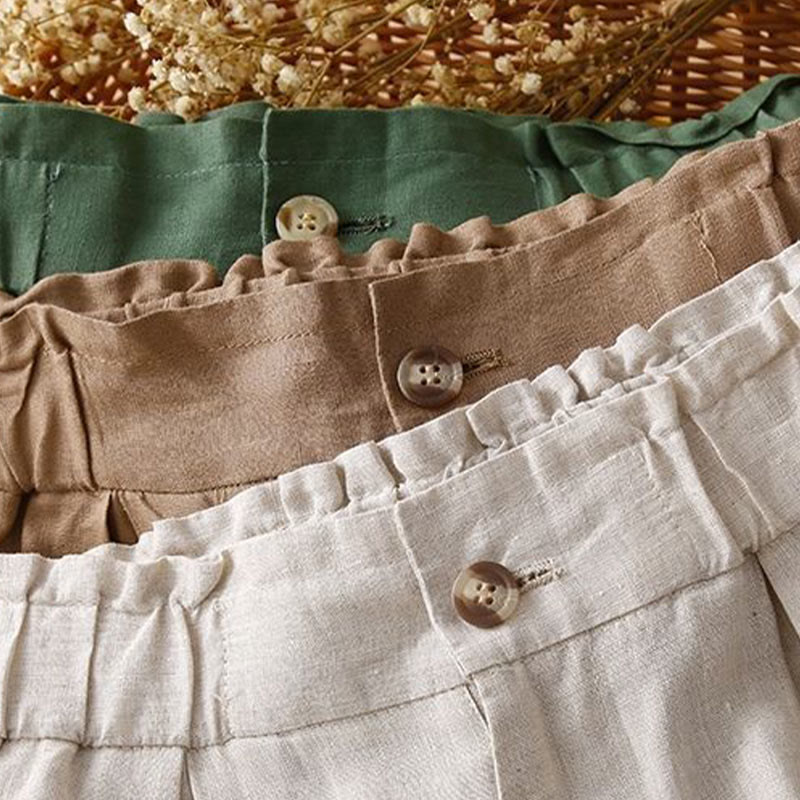 Buddha Stones - Unifarbene, plissierte Shorts aus Baumwollleinen mit Reißverschluss und Taschen