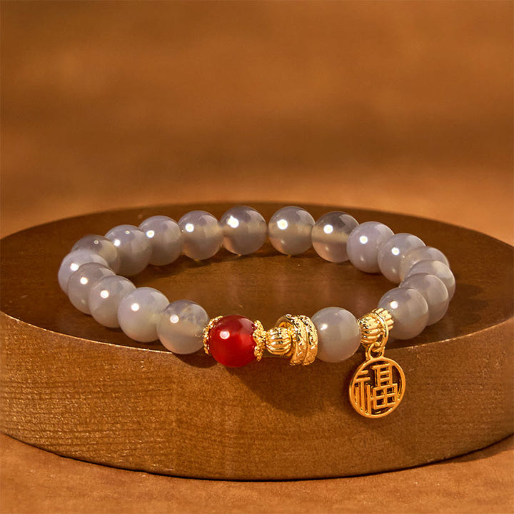 Buddha Stones Jahr der Schlange Grauer Achat Roter Achat Fu Charakter Positivität Armband