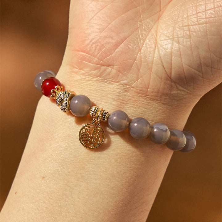 Buddha Stones Jahr der Schlange Grauer Achat Roter Achat Fu Charakter Positivität Armband