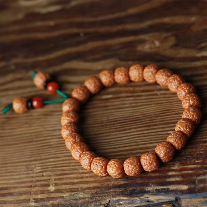 Buddha Stones Tibetisches Rudraksha-Bodhi-Samen-Achat-Reichtumsarmband