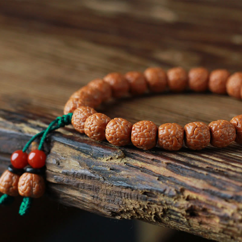 Buddha Stones Tibetisches Rudraksha-Bodhi-Samen-Achat-Reichtumsarmband