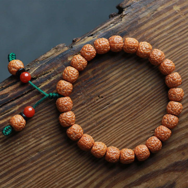 Buddha Stones Tibetisches Rudraksha-Bodhi-Samen-Achat-Reichtumsarmband