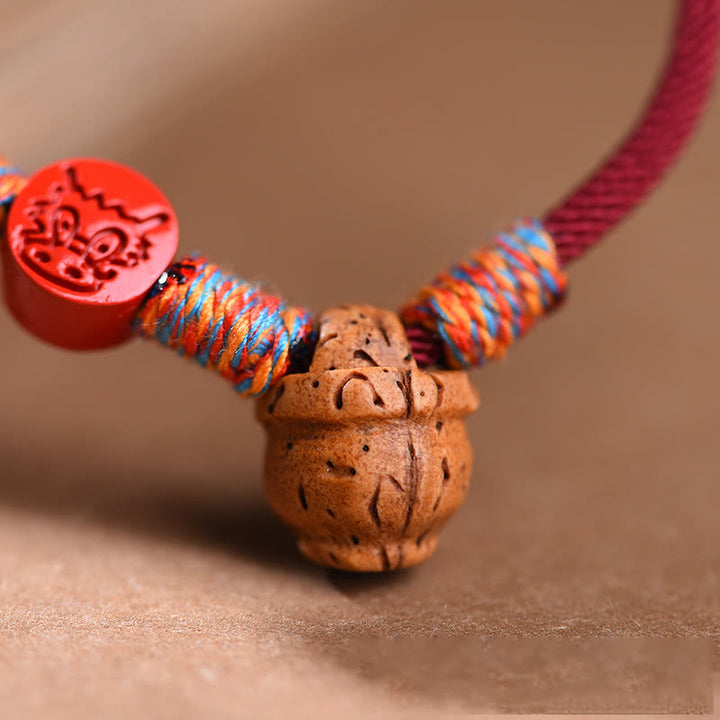 Buddha Stones, handgefertigt, chinesisches Sternzeichen, rote Schnur, Pfirsichkern, Zinnober, Glücksarmband