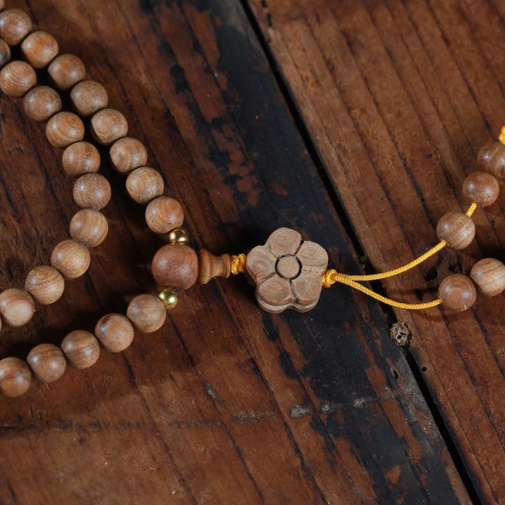 Buddha Stones Sandelholz Pflaumenblüte Charm Heilung Mala Armband